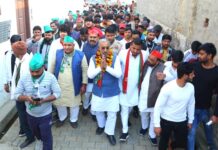 गठबंधन के संयुक्त प्रत्याशी सुरेंद्र कुमार मुन्नी के पक्ष में बम्हैटा में सभा